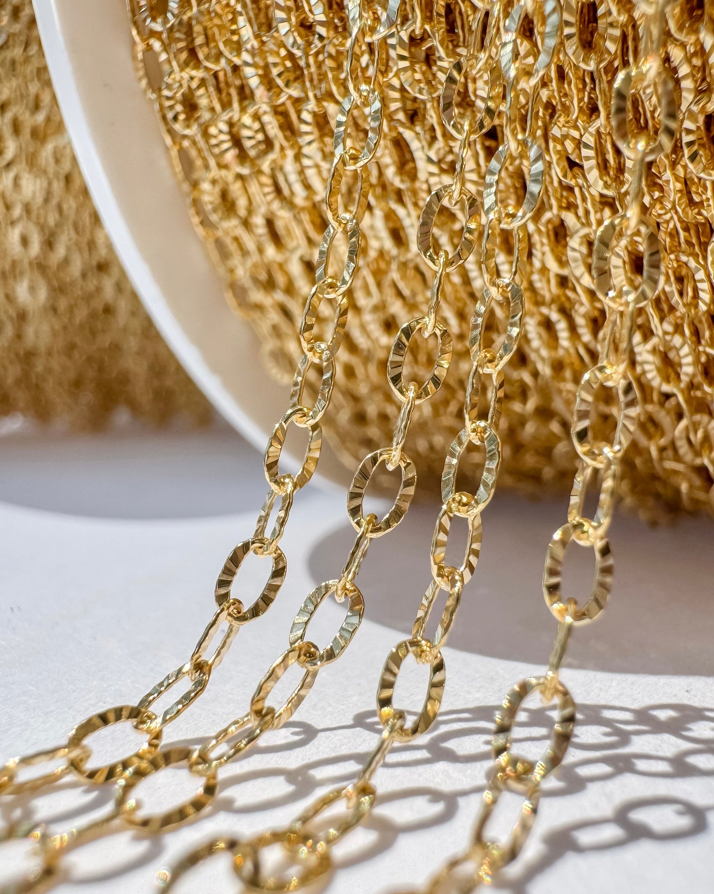 Open Oval Sunburst chain by the foot